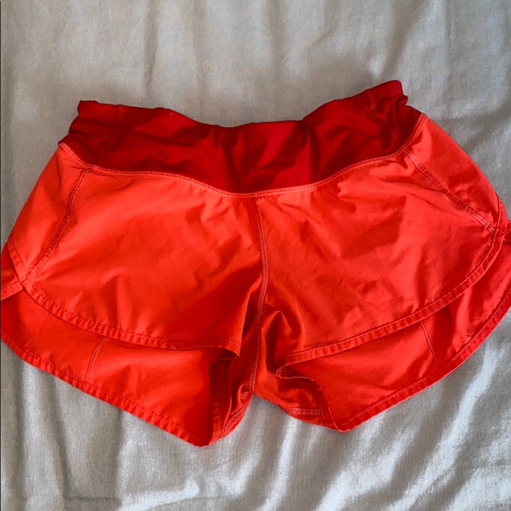Lulu lemon coral and red 2.5 inch shorts size 6